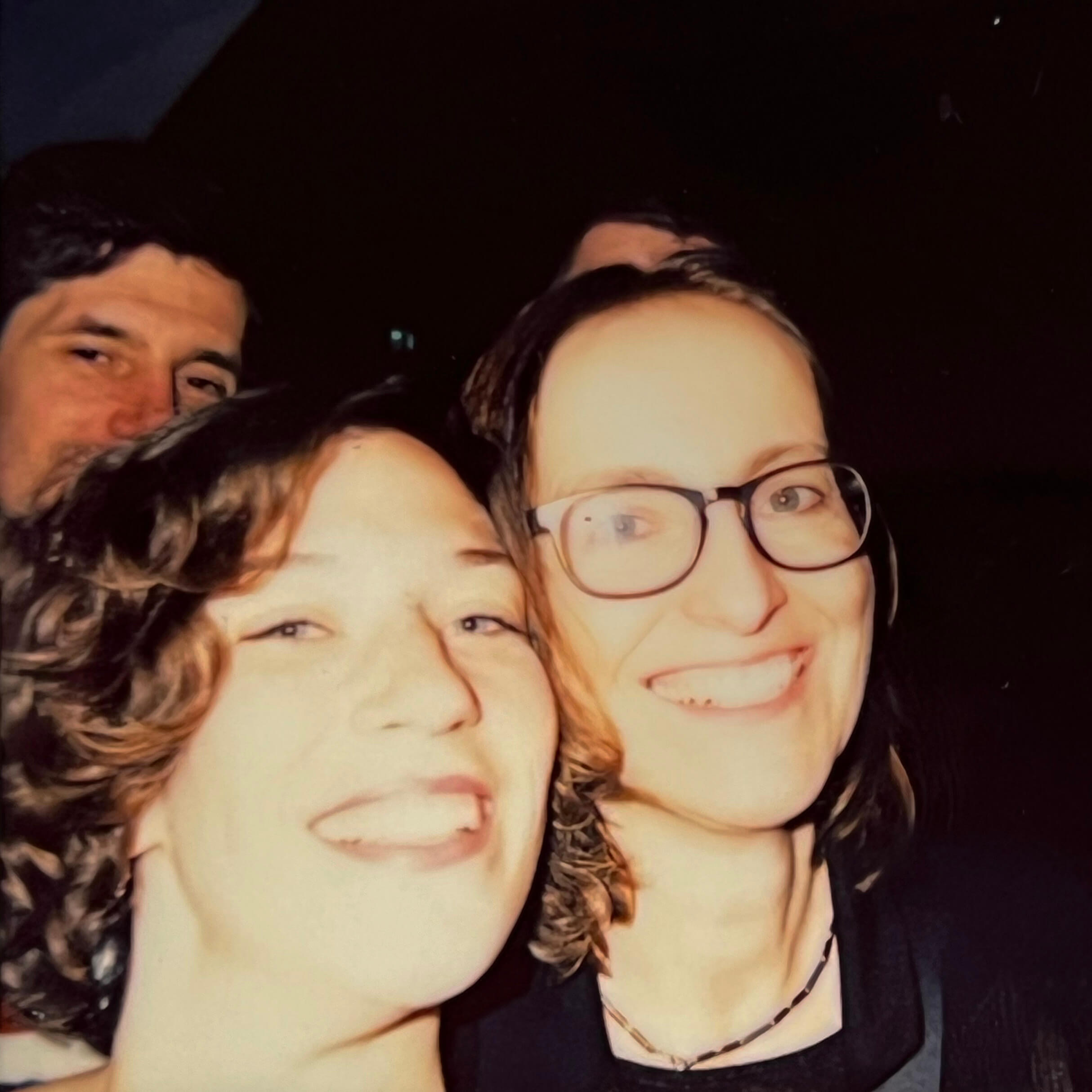 Two Keen employees next to each other smiling